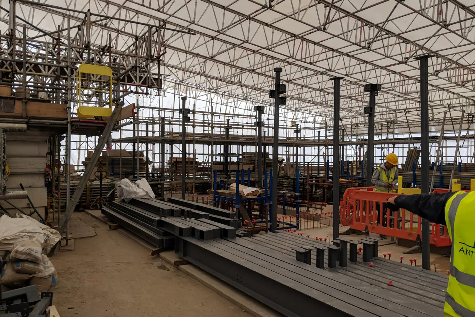 Construction work under large temporary roof