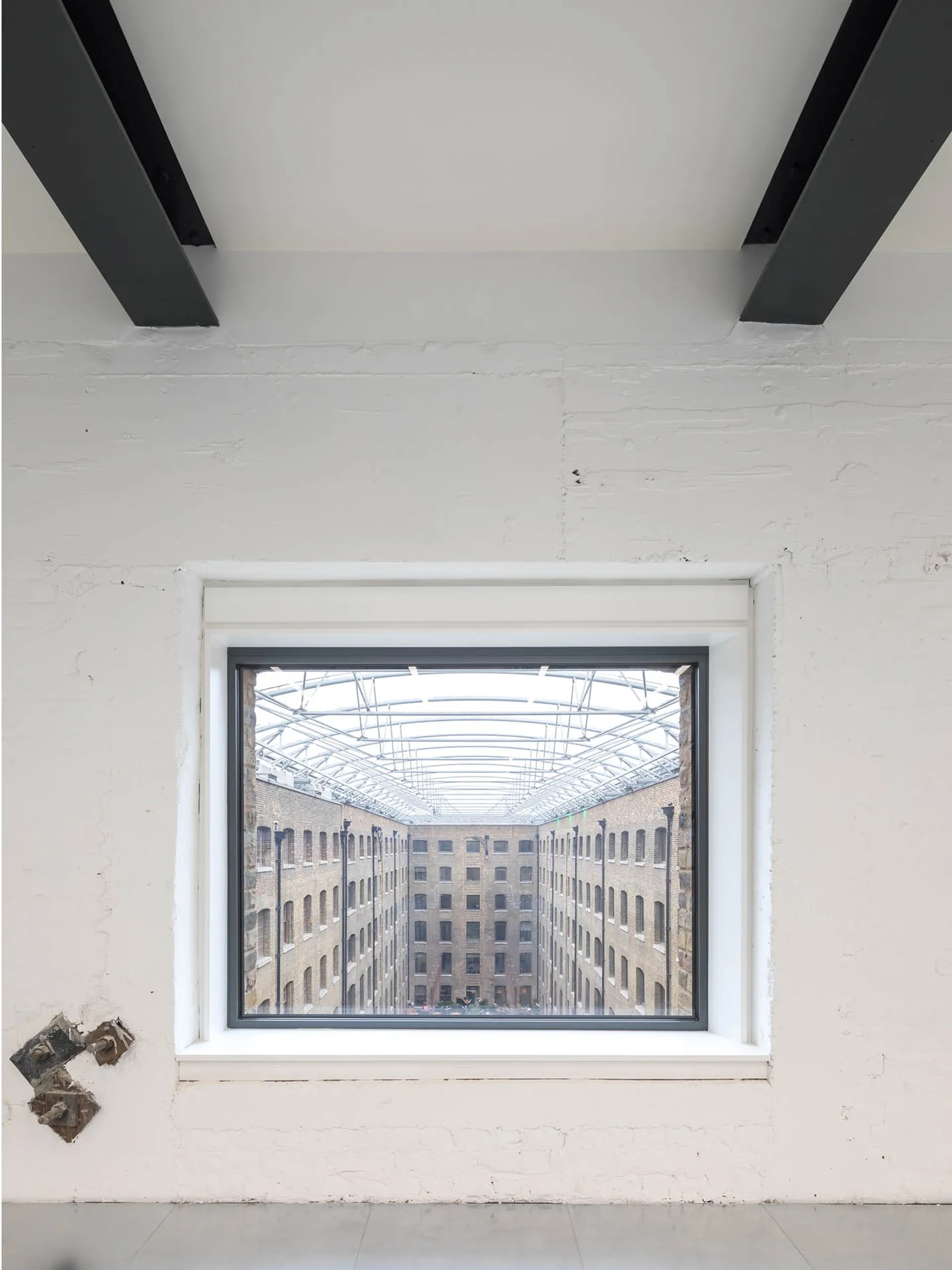 View from an upper office window across surrounding buildings