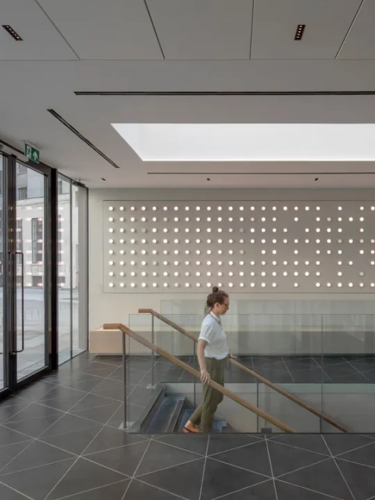 interior with person walking down the stairs