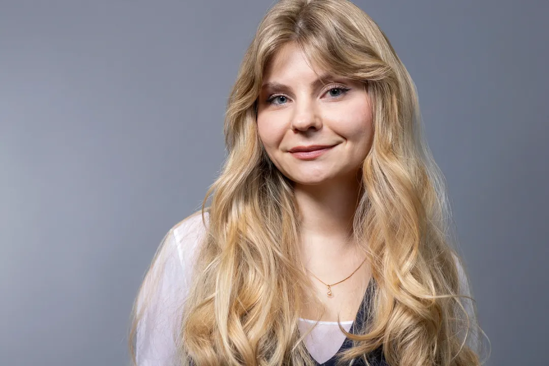 Portrait of woman with long blond hair