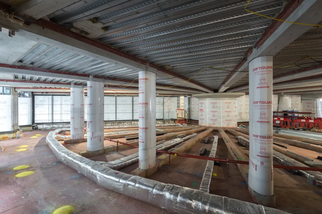Shell view of open plan floor with fireproofed columns