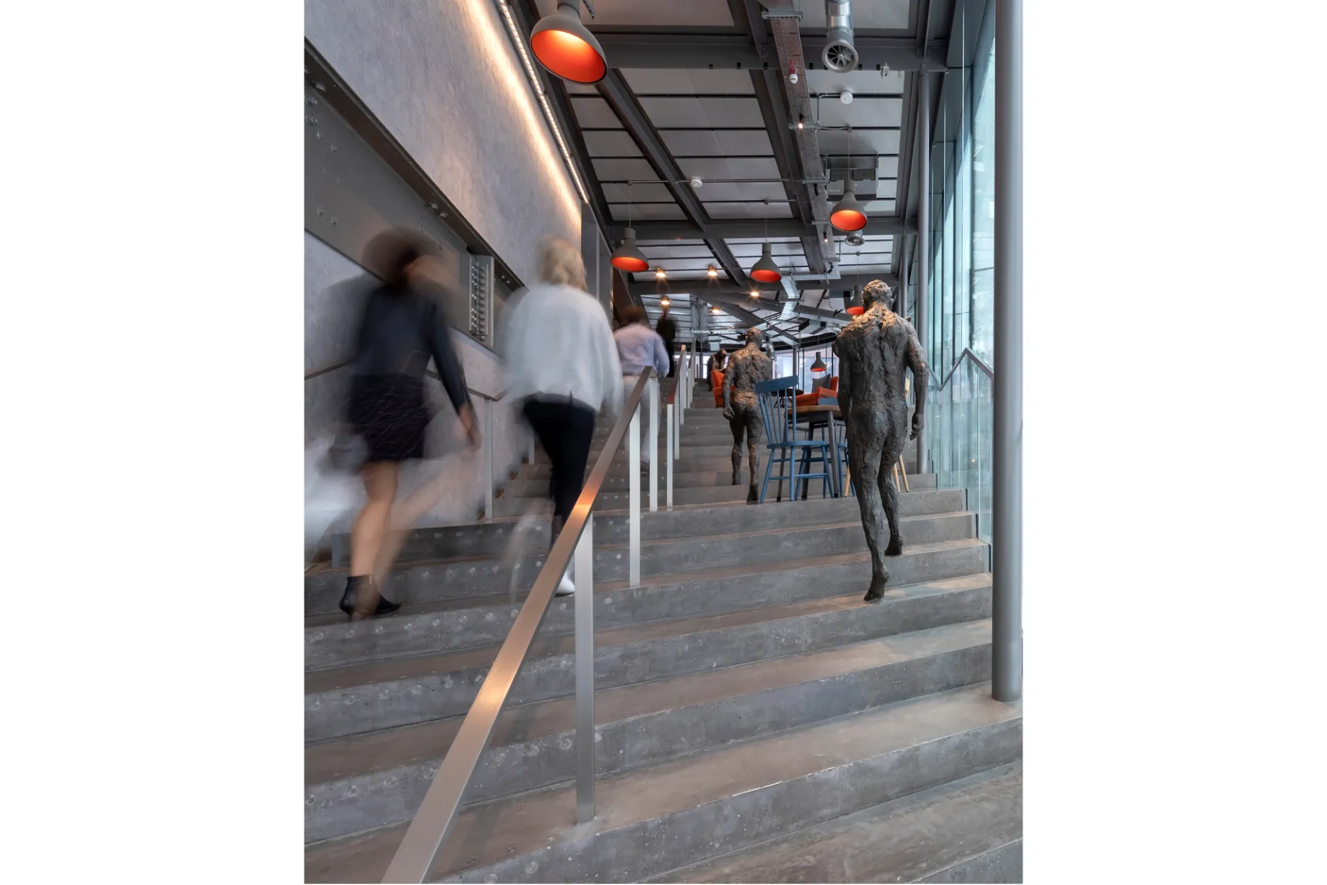 people walking up the grand stairway