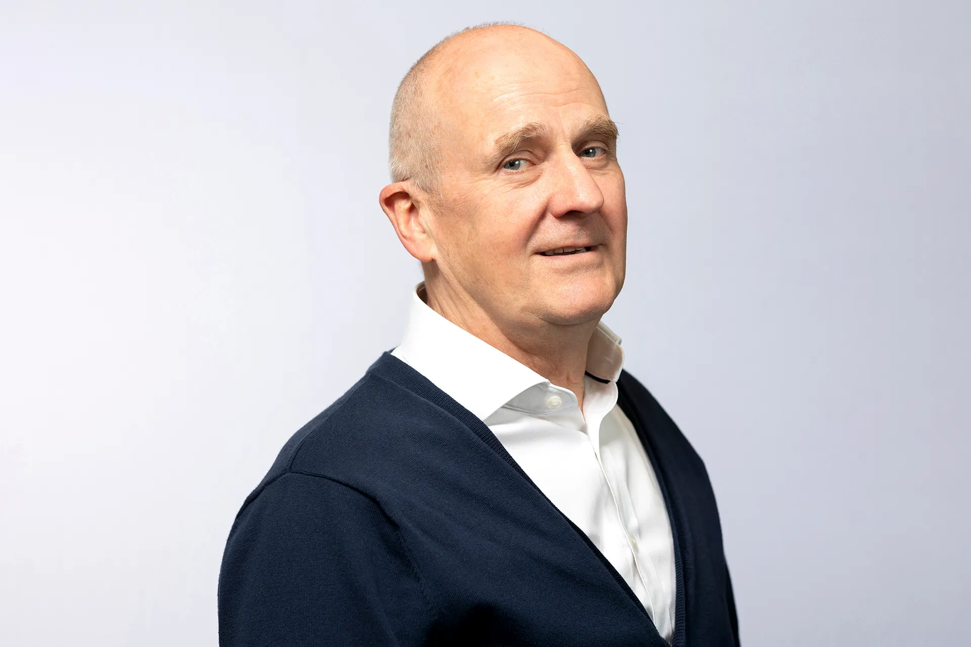 Portrait of Mark Wibberley in white shirt and jacket