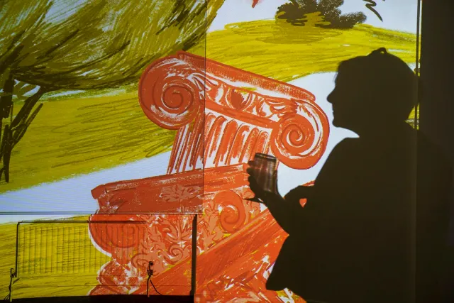 shadow of woman and video projection