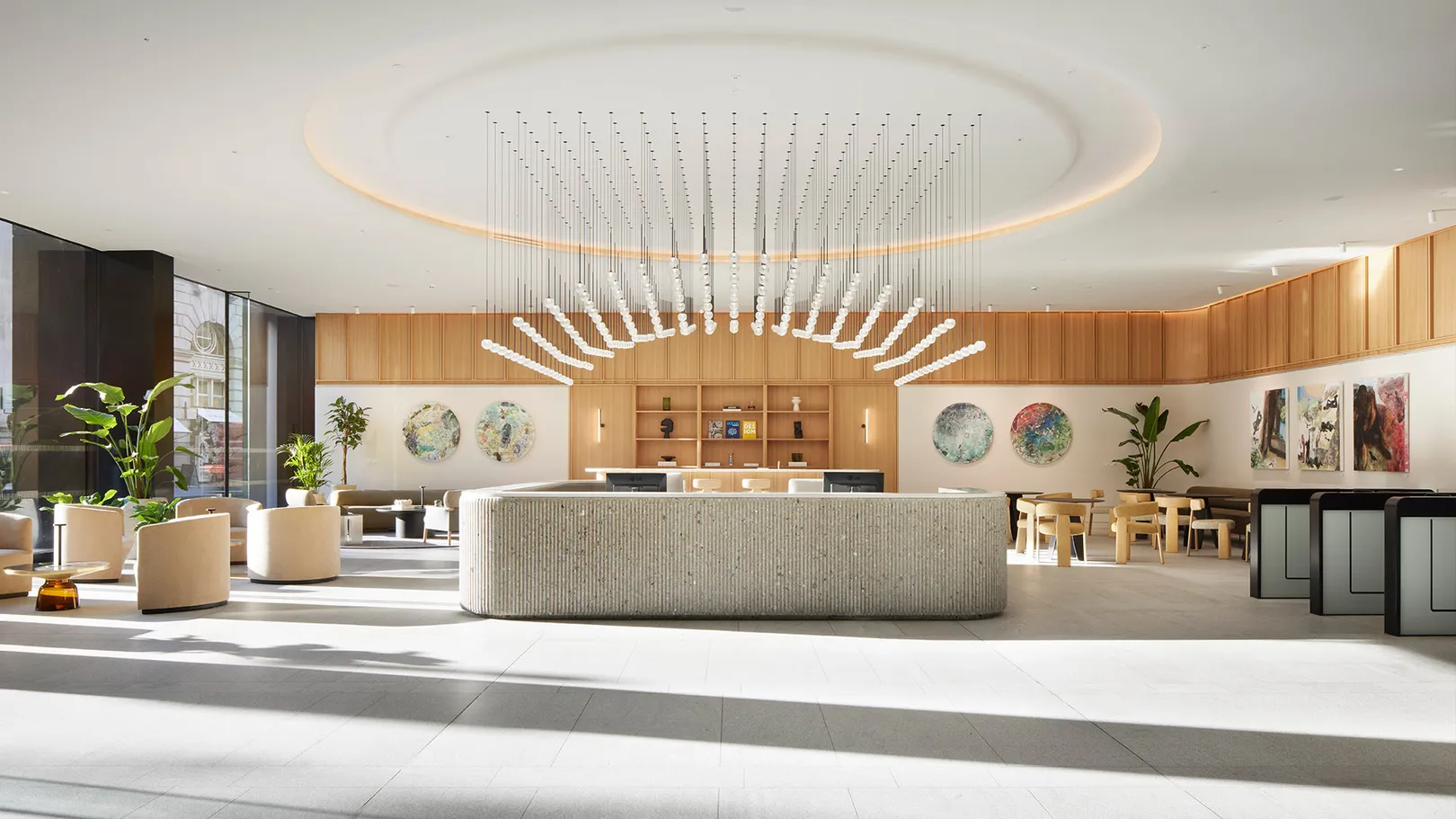 Photograph of the reception desk with coffee bar and seating in the background