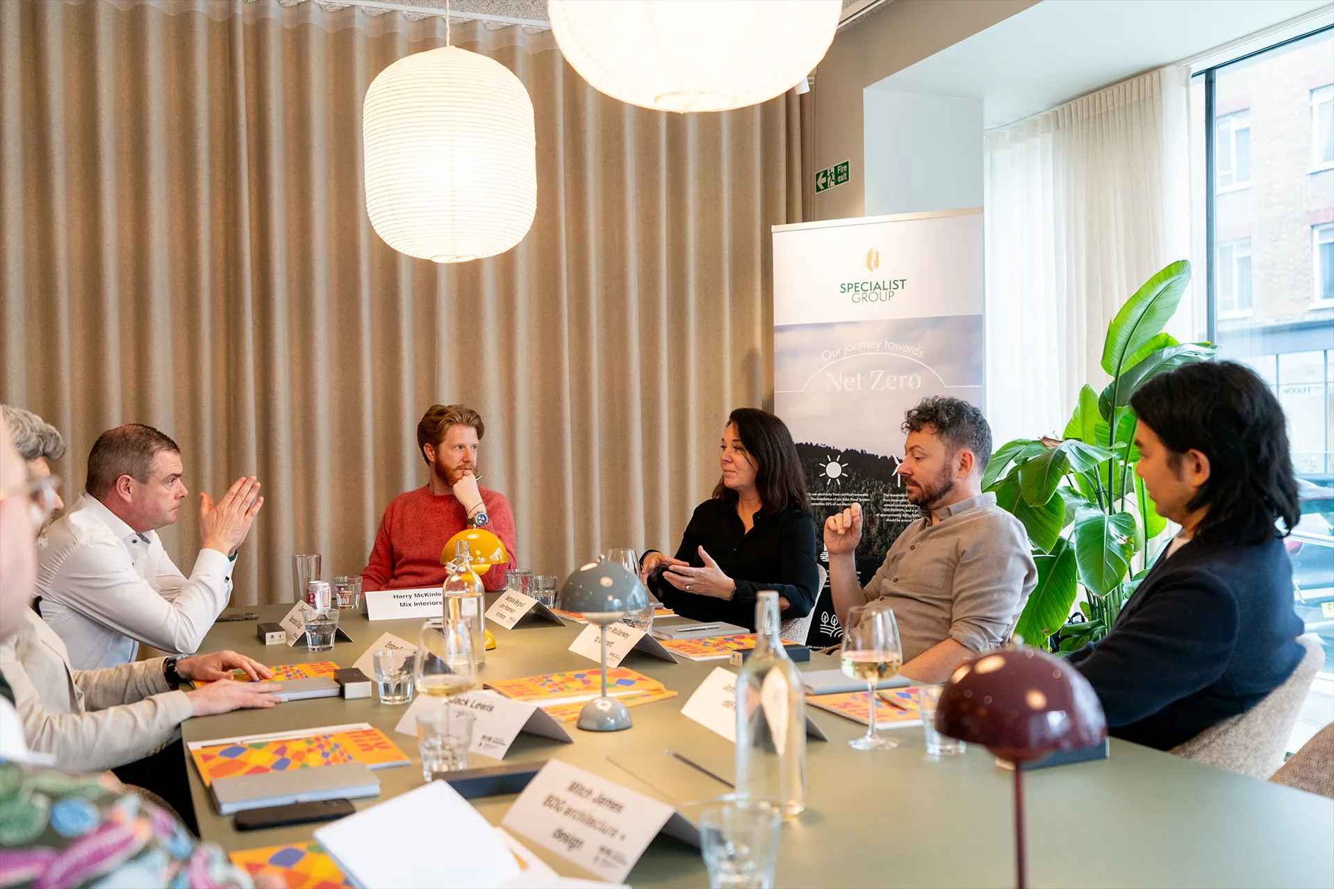 Nathalie in round table discussion with colleagues