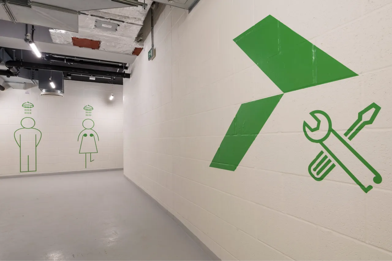 green wayfinding interior campus