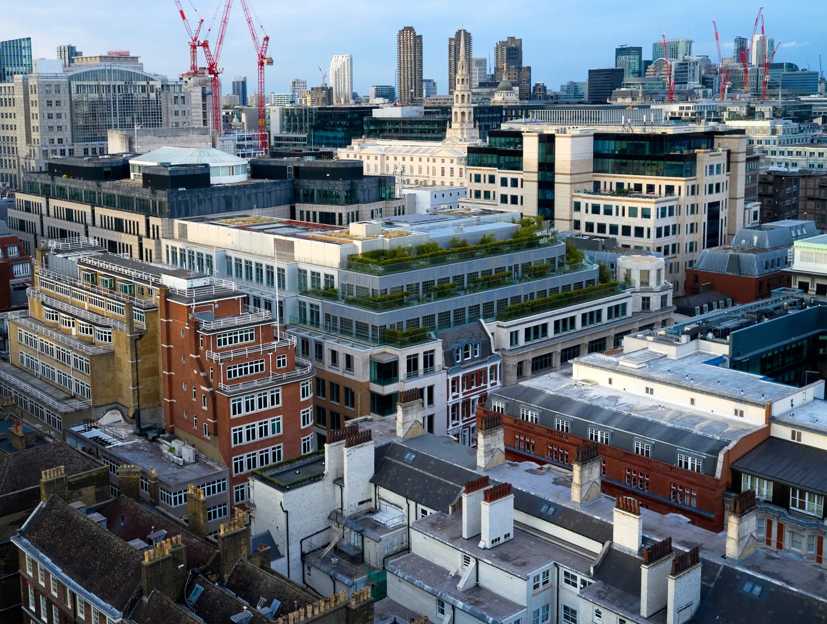 Aerial view of building in central London with large roof extension