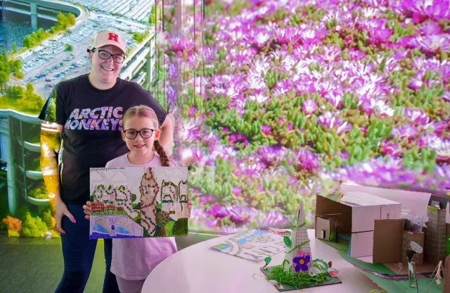 child with her artwork