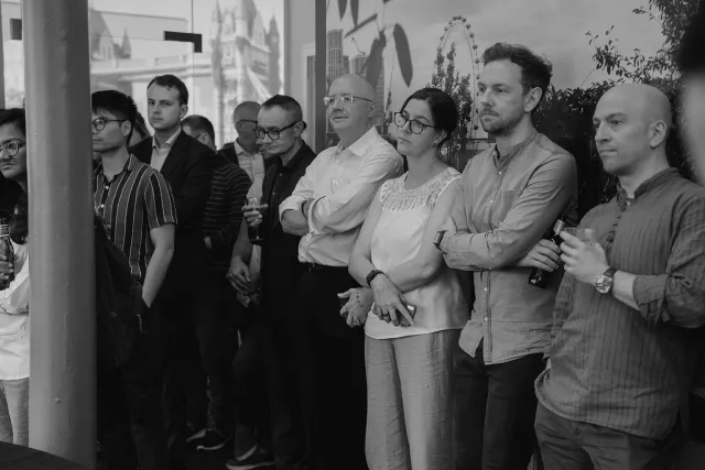 Audience at exhibition listening to talk