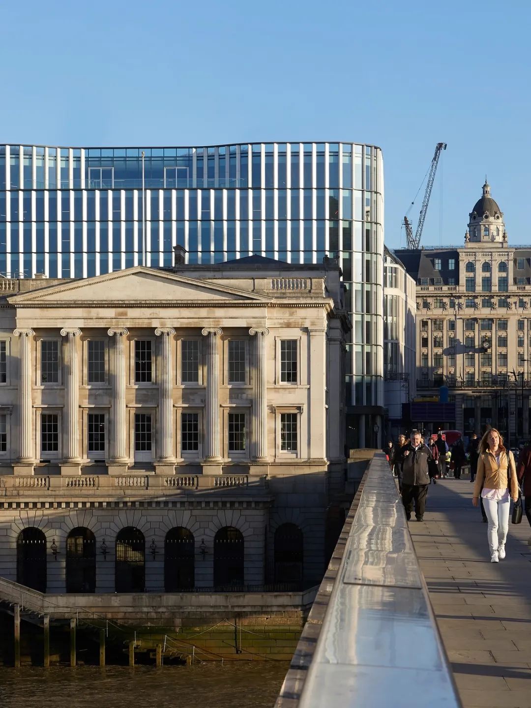 View from London Bridge over River Thames with buildings