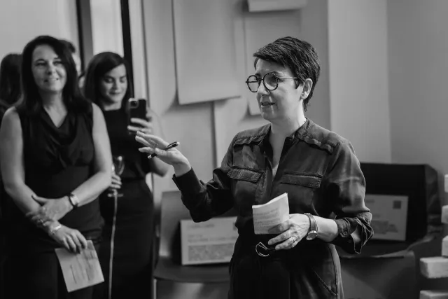 persona talking at exhibition