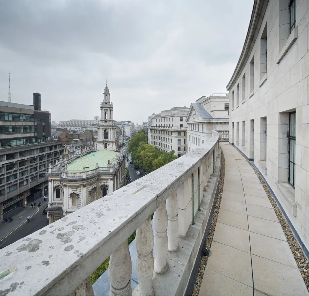 balcony of historical building with view of historical church