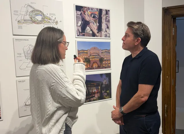 Photograph of women interviewing Architect Kuros