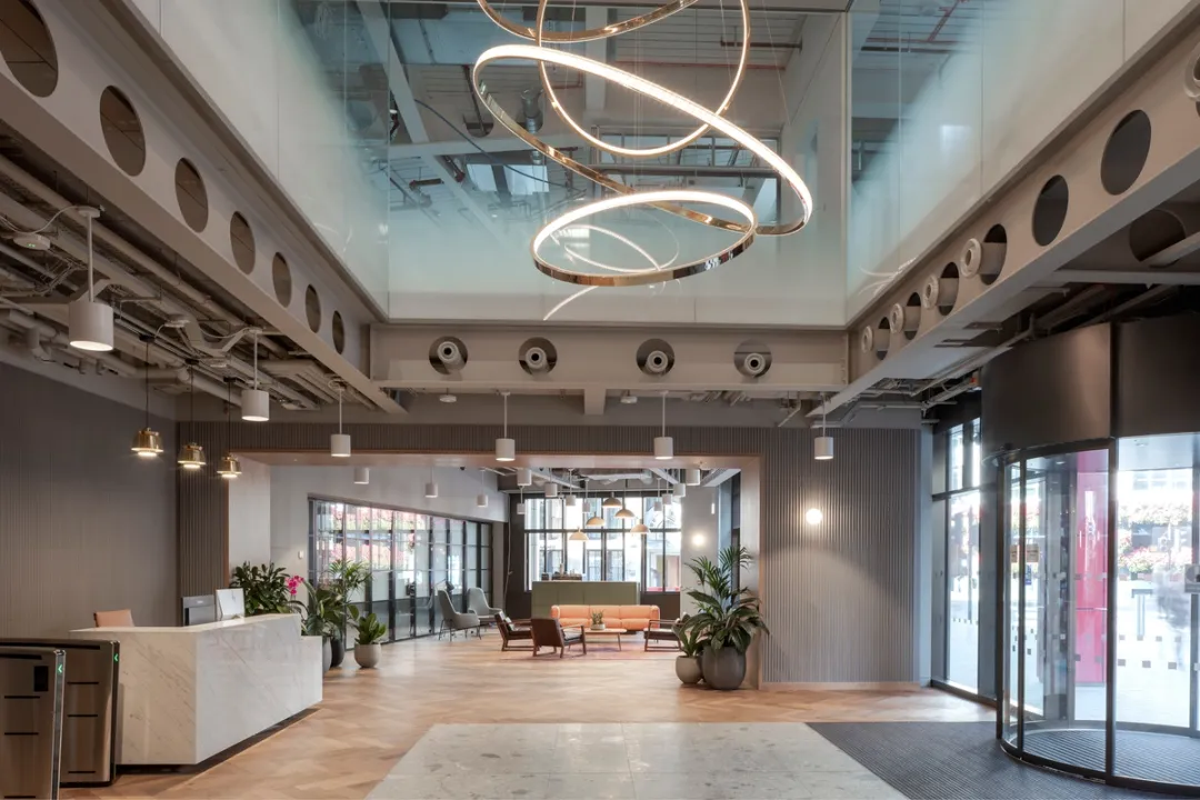 image of building lobby with circular large ceiling lamp