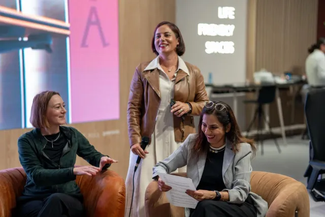 people talking at conference