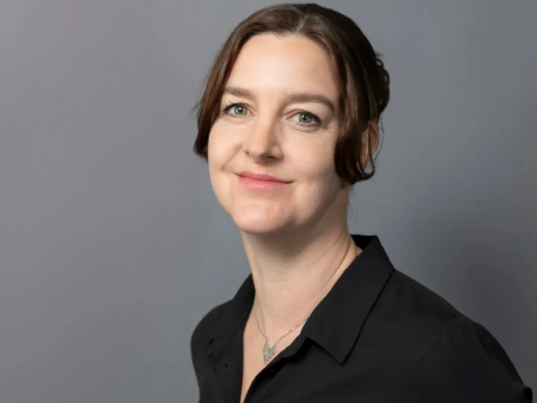 Portrait of person in black shirt
