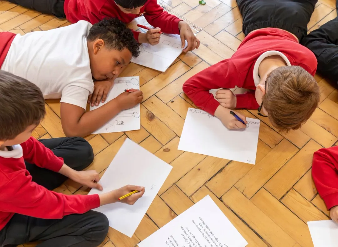 Images of school children sketching