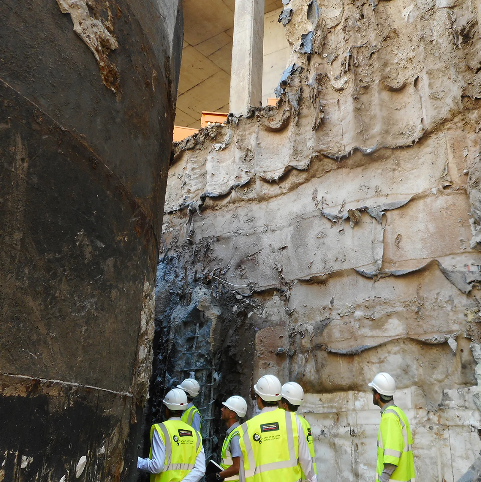 Workmen inspecting construction works