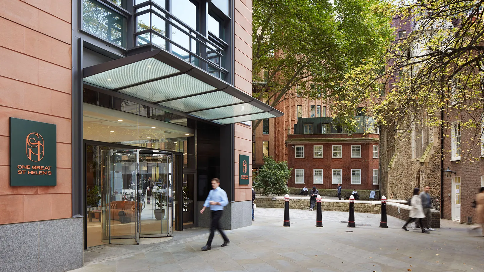 Man walking into One Great St Helen's Entrance