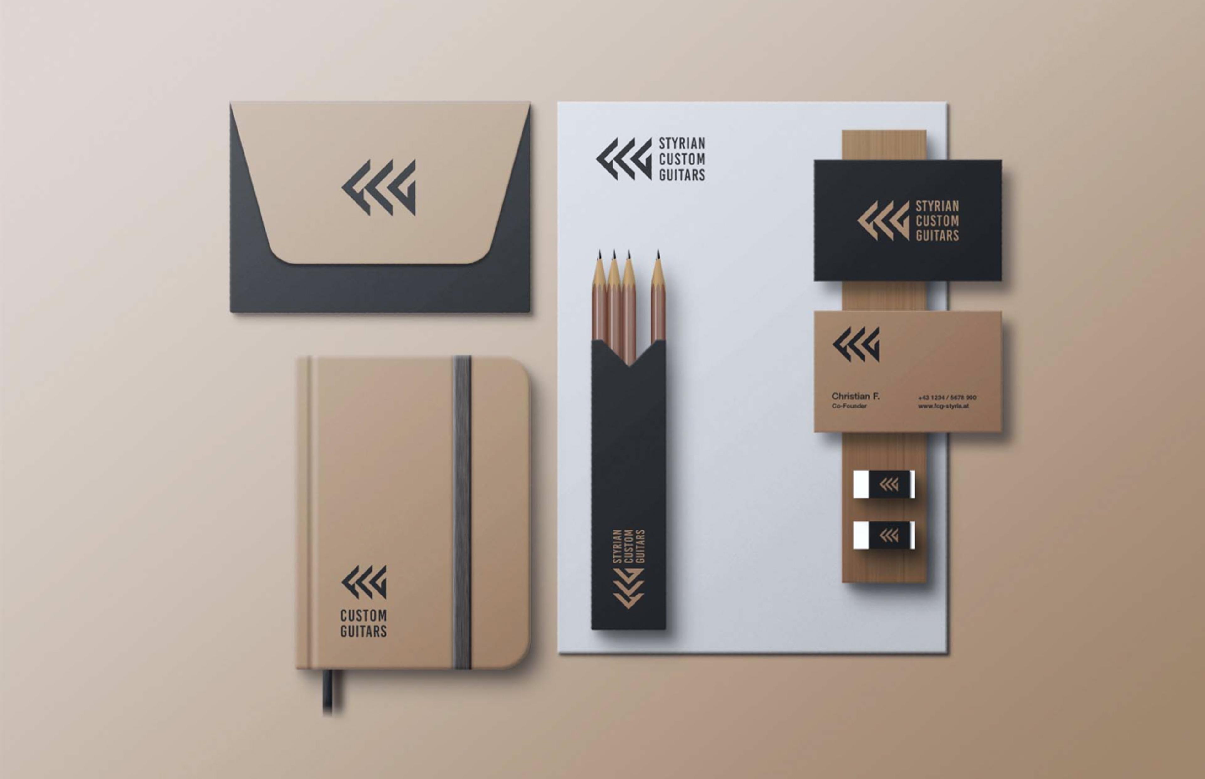Corporate Branding für Styrian Custom Guitars, gestaltet von Unerwartet Design, mit hochwertigem, minimalistischem Design auf Notizbüchern, Visitenkarten und USB-Sticks.