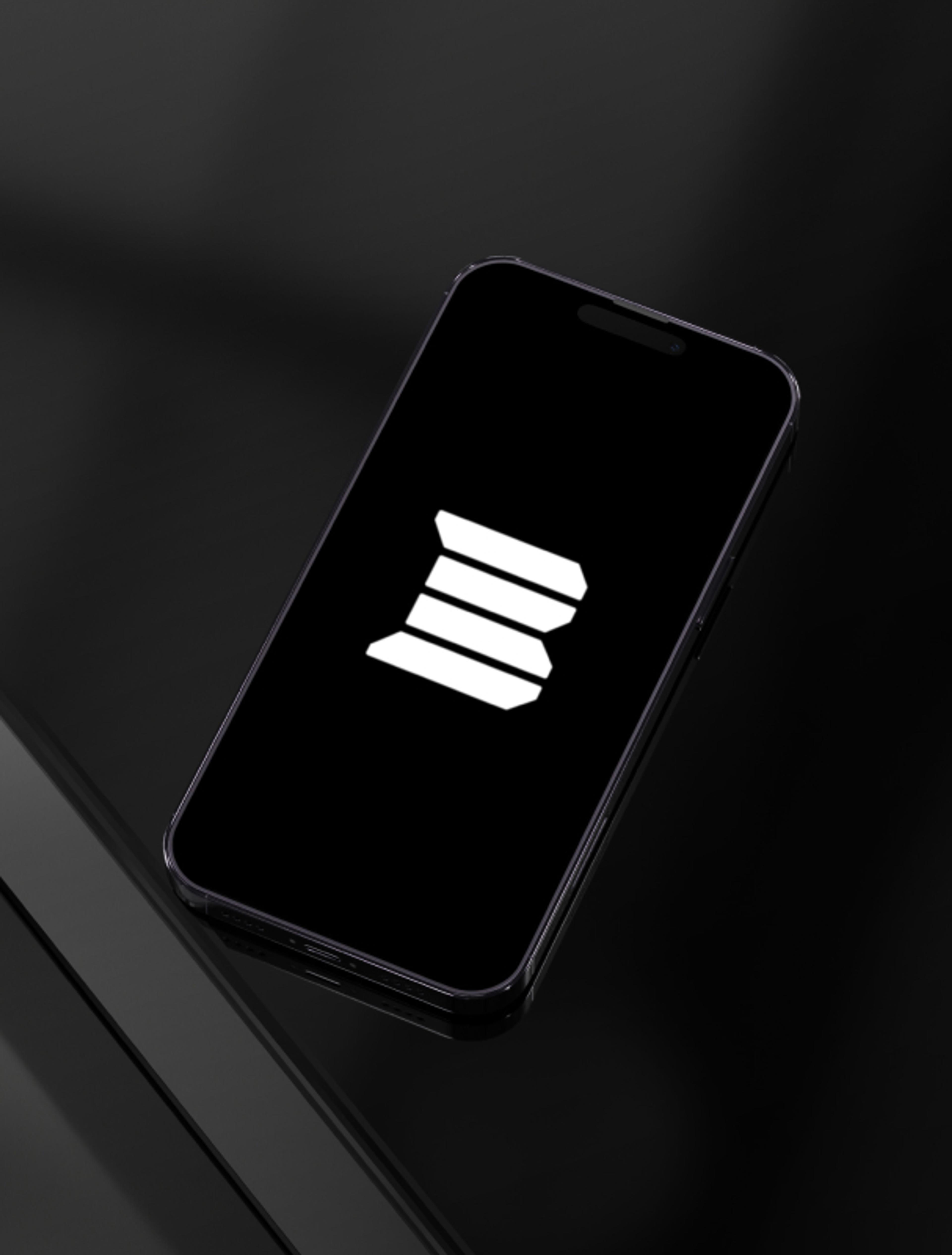 Smartphone mit der Buron Energy Solutions App und leuchtendem Markenlogo auf schwarzem Bildschirm.