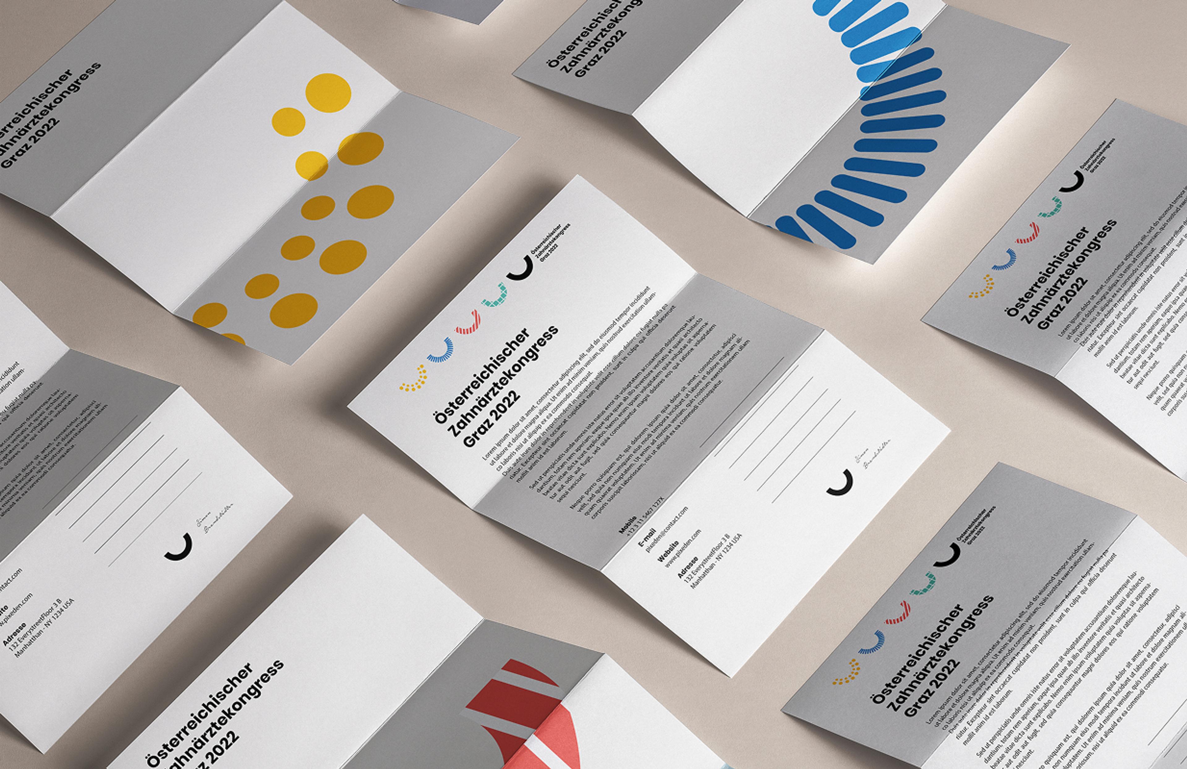 Mehrere Einladungen zum Österreichischen Zahnärztekongress Graz 2022 mit stilisierten Halbkreis-Logos und modernem Layout, entworfen von Unverwartet Design.