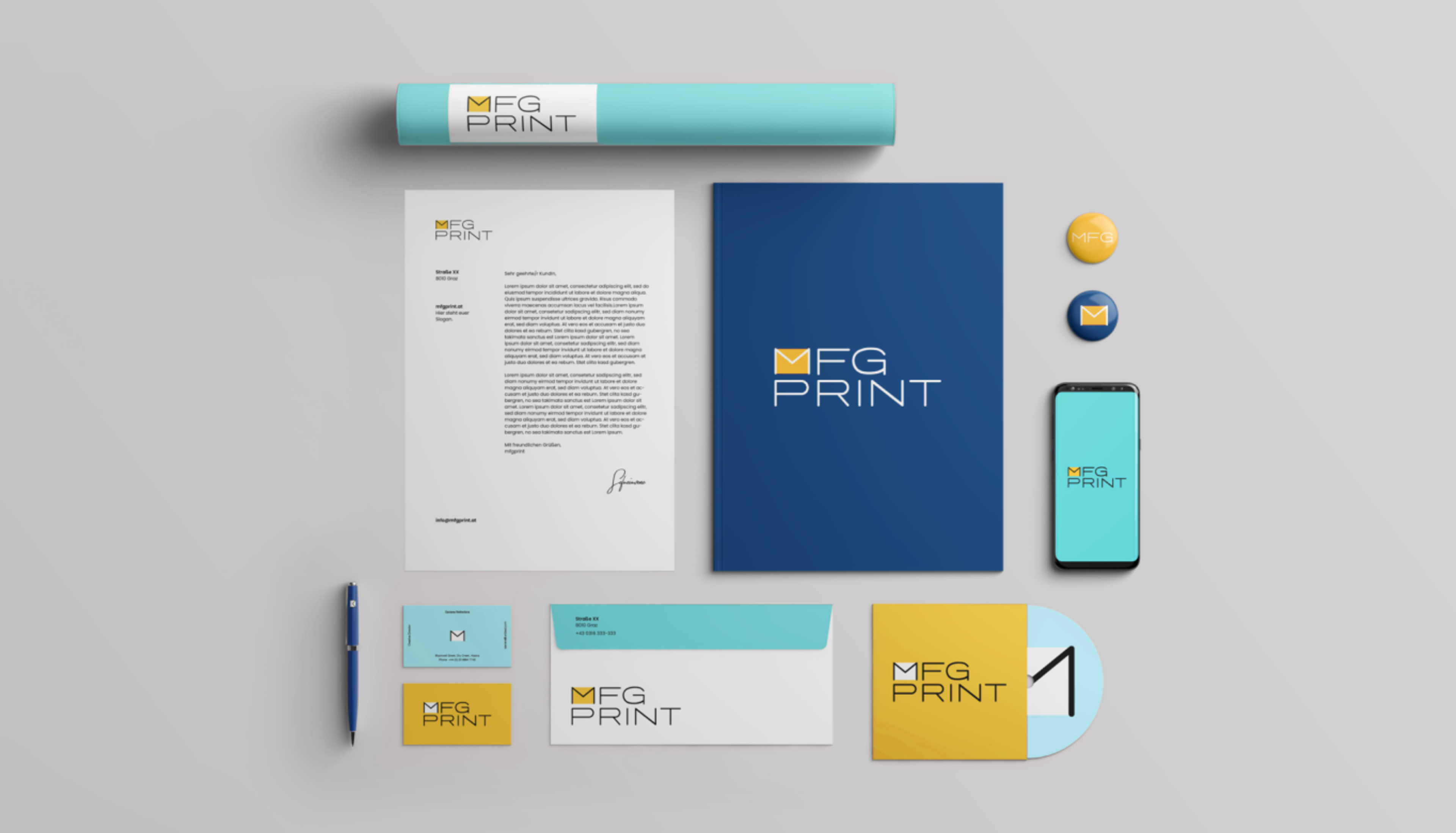 Branding-Set von MFG Print mit Notizbuch, Tasche und Stift, ein Projekt der Medienfabrik.