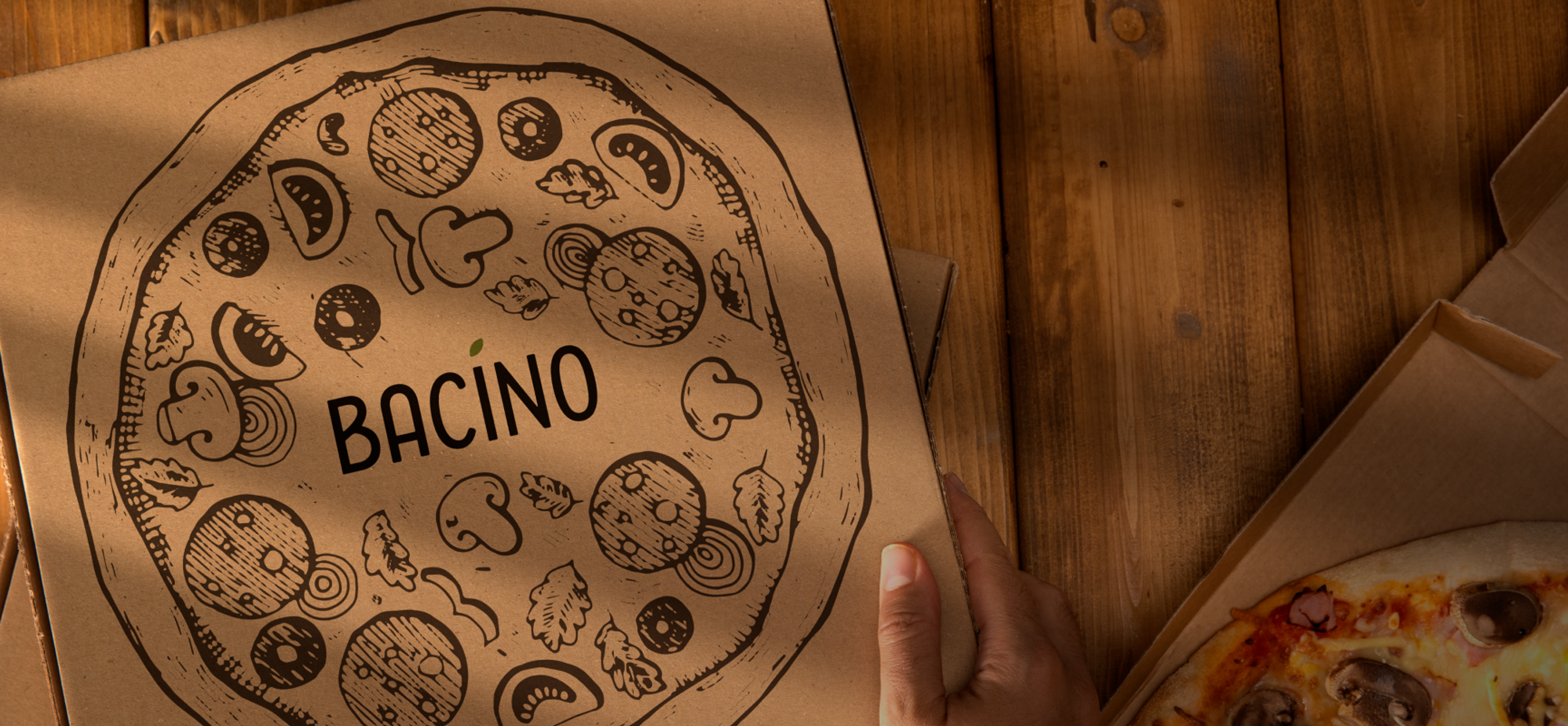 Detailaufnahme einer Pizzabox von Bacino mit handgezeichneten mediterranen Illustrationen.