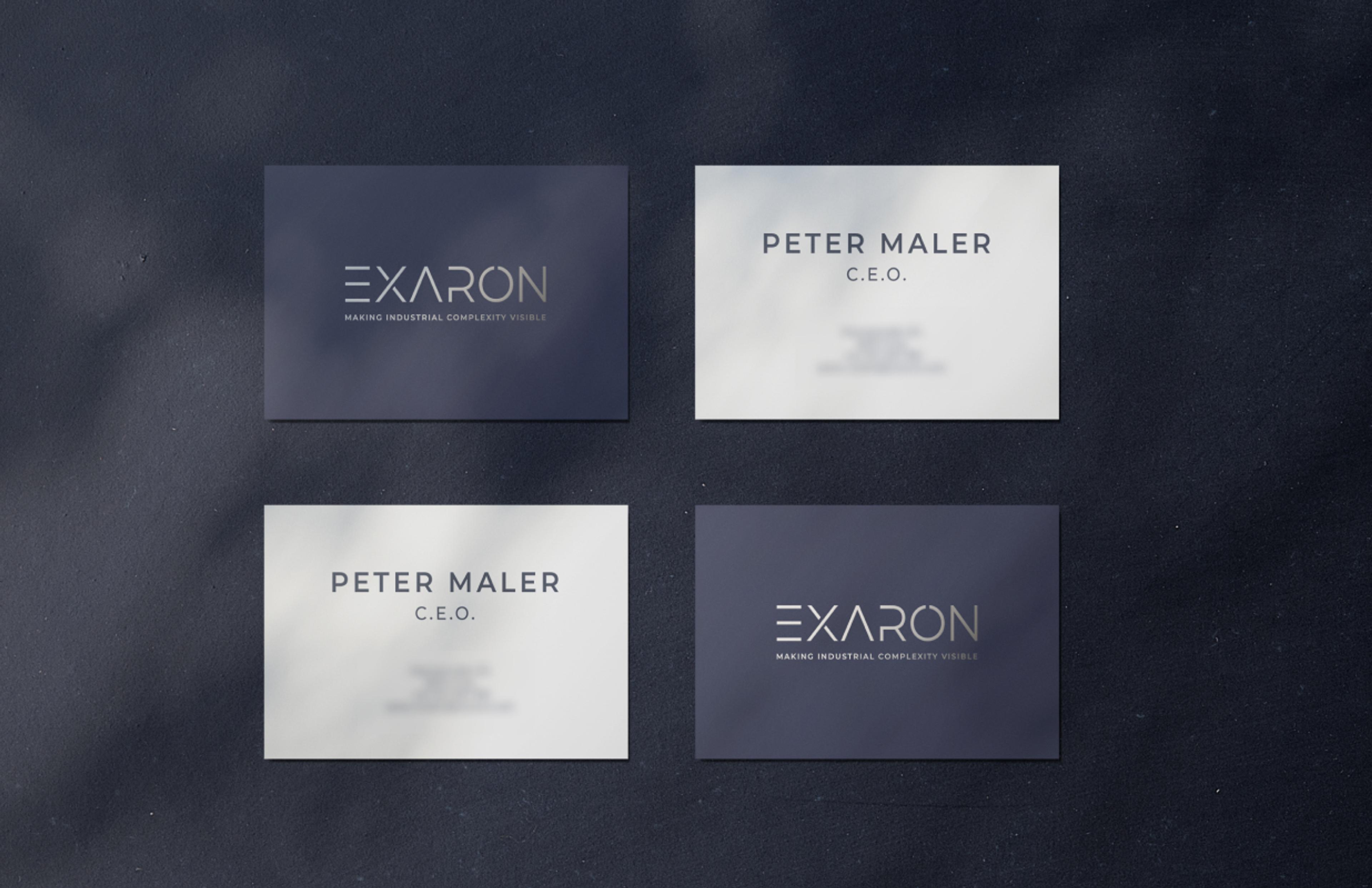 Visitenkartendesign für Exaron, entwickelt von Unerwartet Design, mit klaren, futuristischen Details und einer modernen, technischen Ästhetik.
