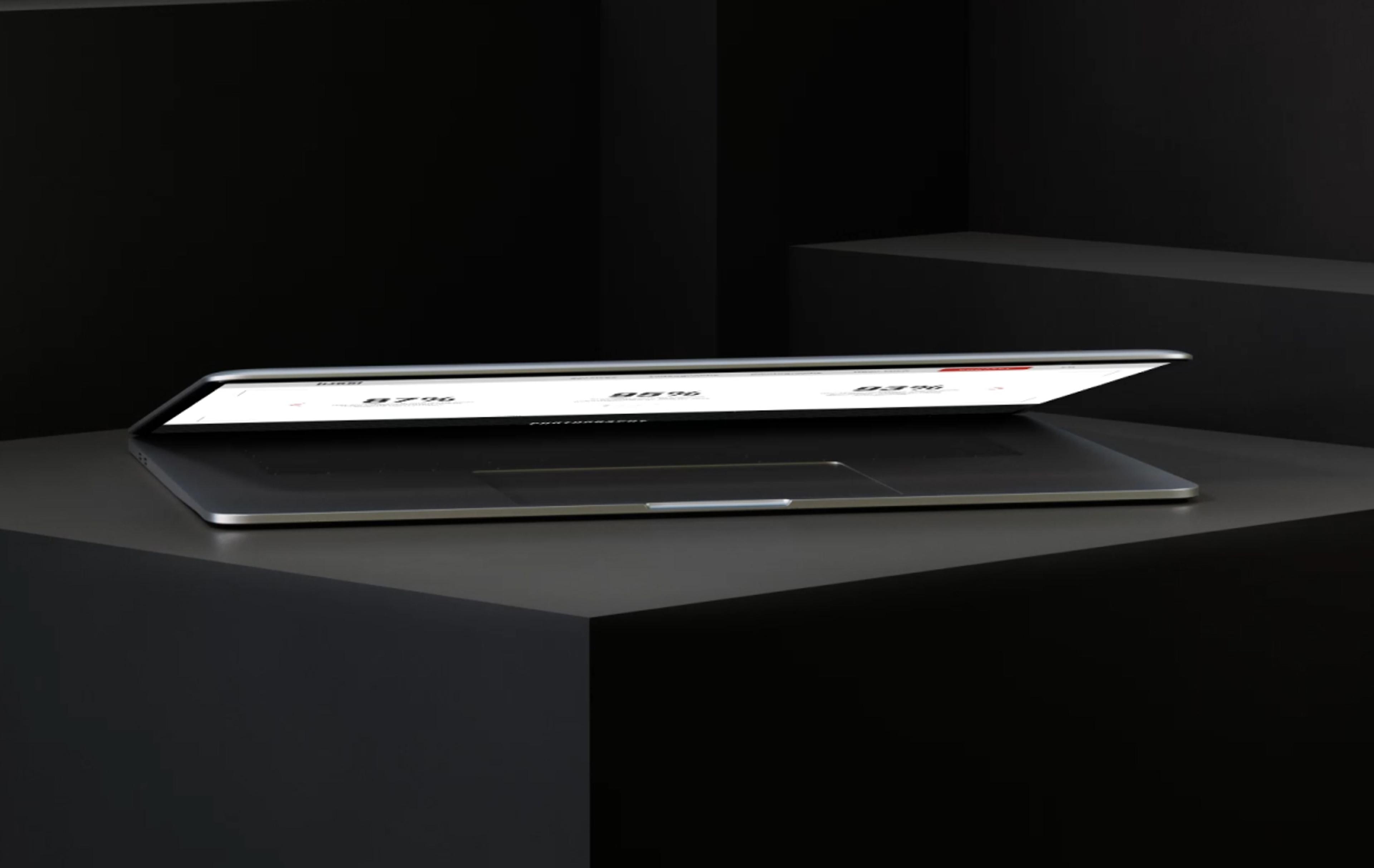 Laptop mit Ijob-Website auf schwarzem Untergrund – Ein silbernes MacBook, leicht geöffnet, mit einer erkennbaren Vorschau der Ijob-Website. Die minimalistische, dunkle Umgebung hebt das schlanke Design hervor.