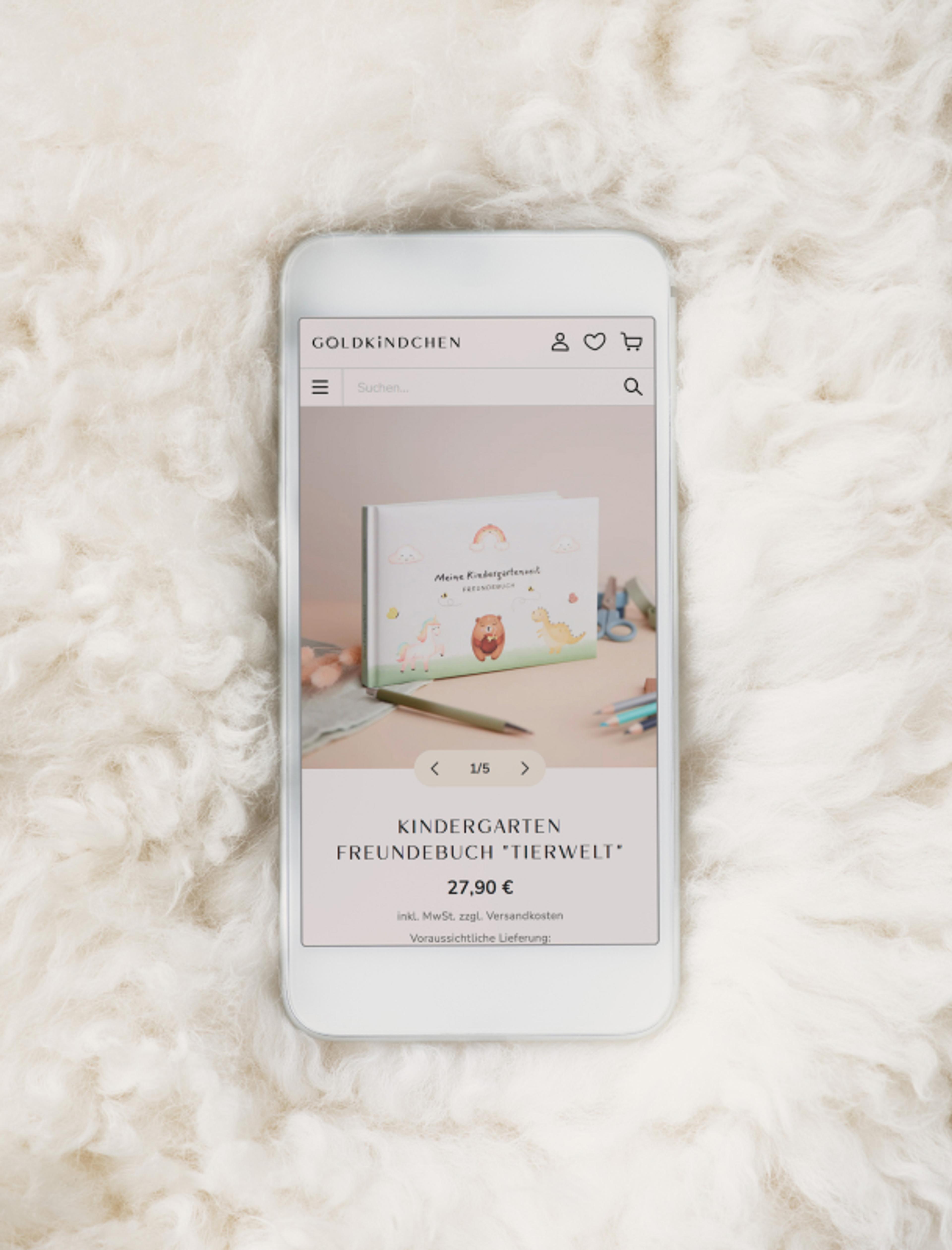 Mobile Webshop-Ansicht von Goldkindchen mit Fokus auf das Freundebuch für Kinder, optimiert für Smartphones. Von Unerwartet Design.