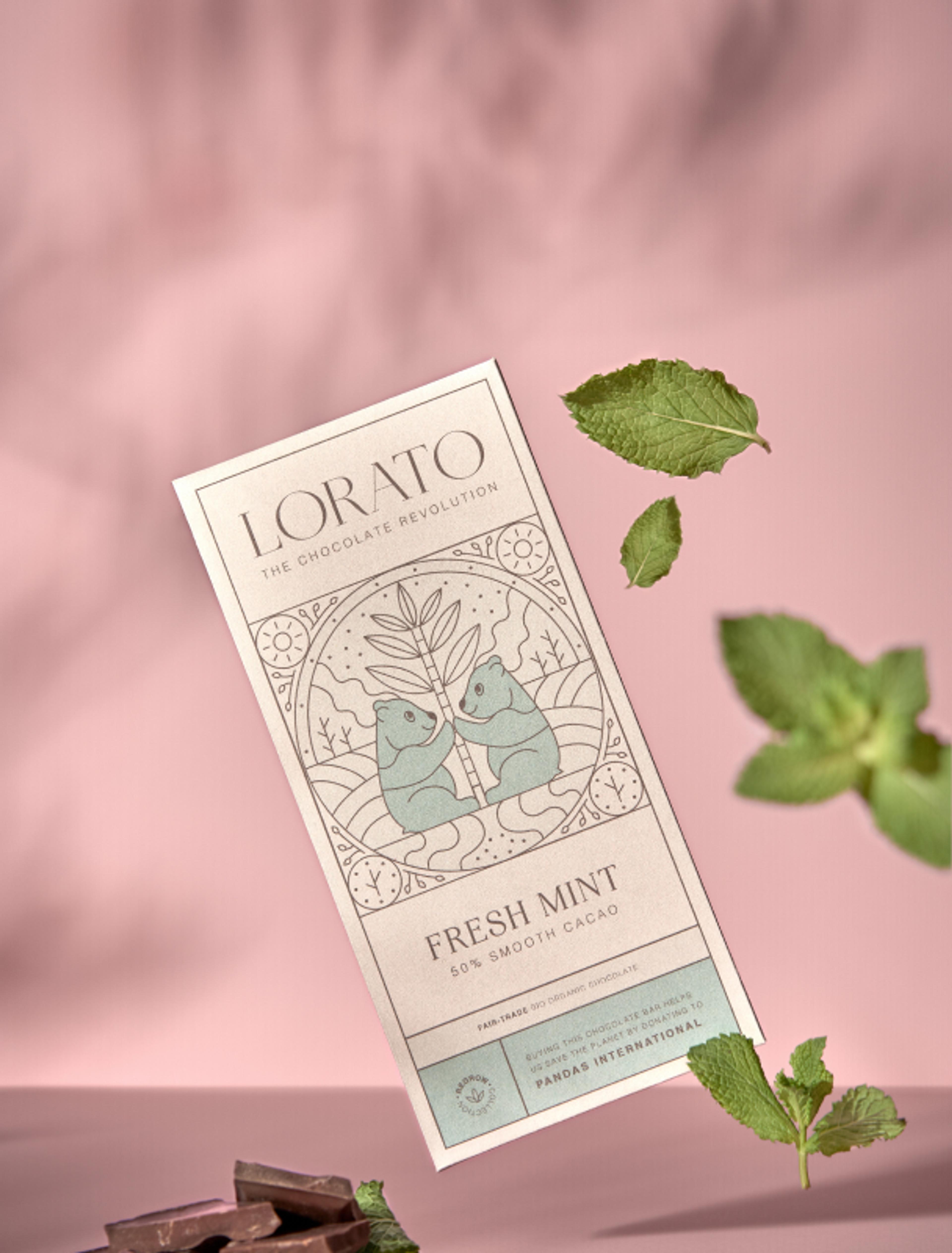 Lorato Fresh Mint Schokolade mit stilisierten Pandas und Minzblättern auf der Verpackung. Fair-Trade-Schokolade mit Spende an Pandas International.
