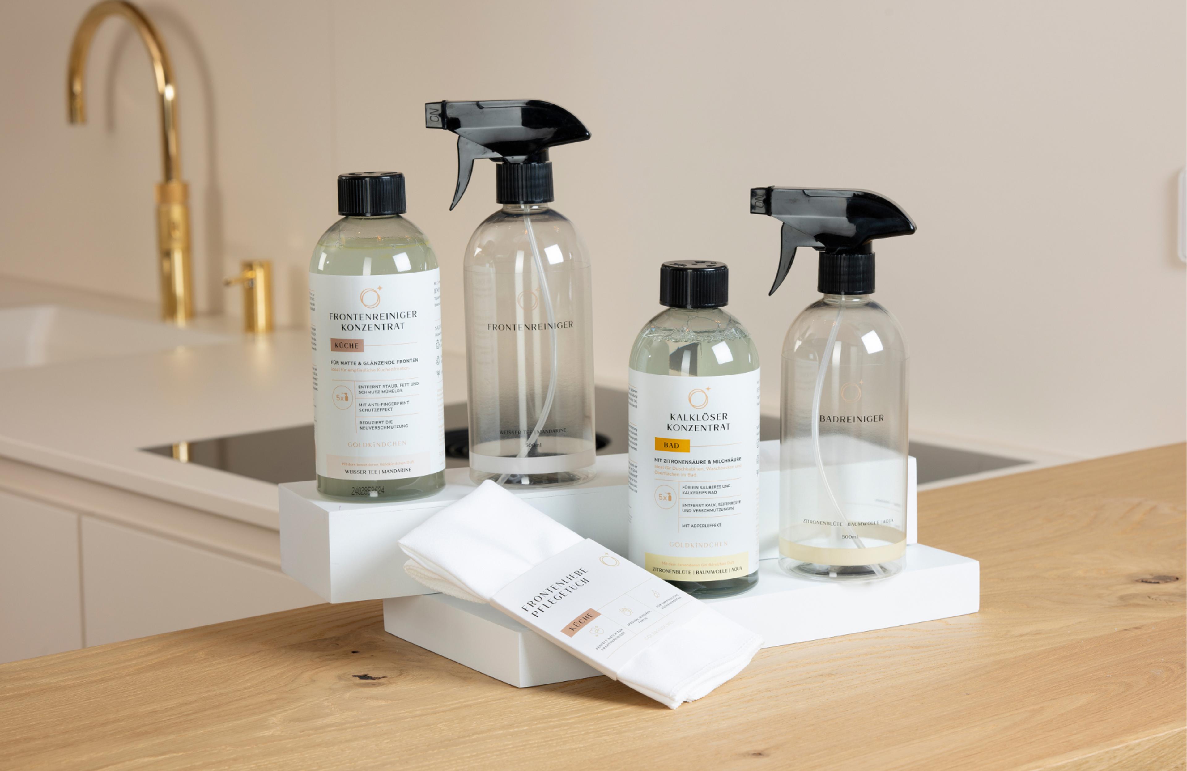 Hochwertige Goldkindchen Reinigungsprodukte wie Küchenreiniger und Badreiniger, mit modernem Branding von Unerwartet Design