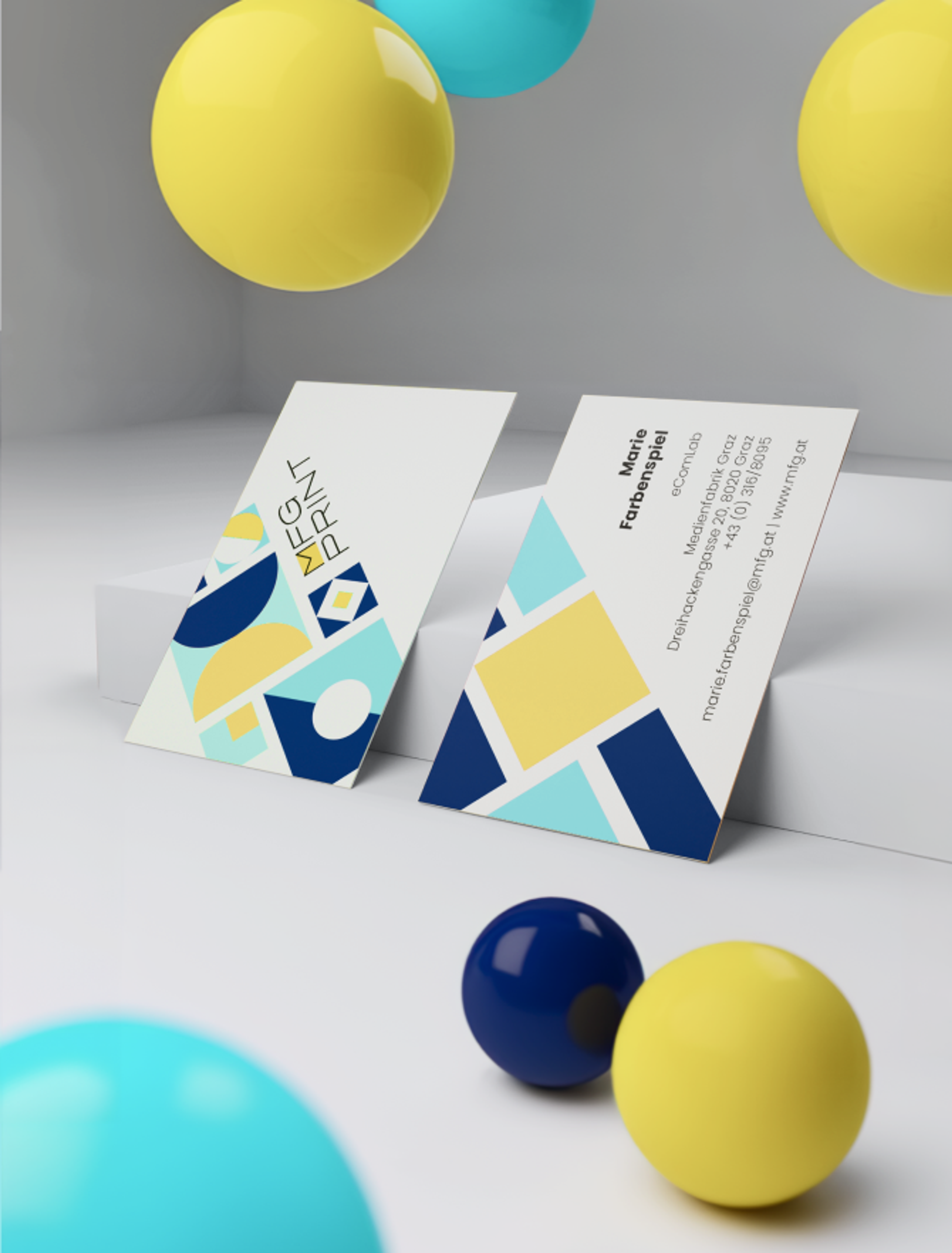 Design der Visitenkarten für MFG Print mit buntem geometrischem Muster.