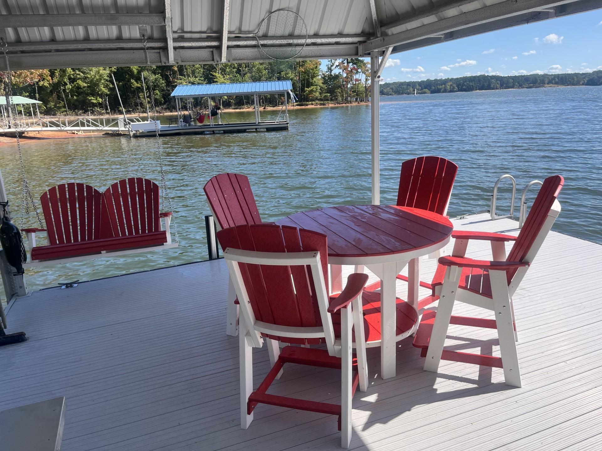 LCC-102 Heritage Porch Swing in Cardinal Red and White with LCC-180 5-Piece 48in Counter Set on dock