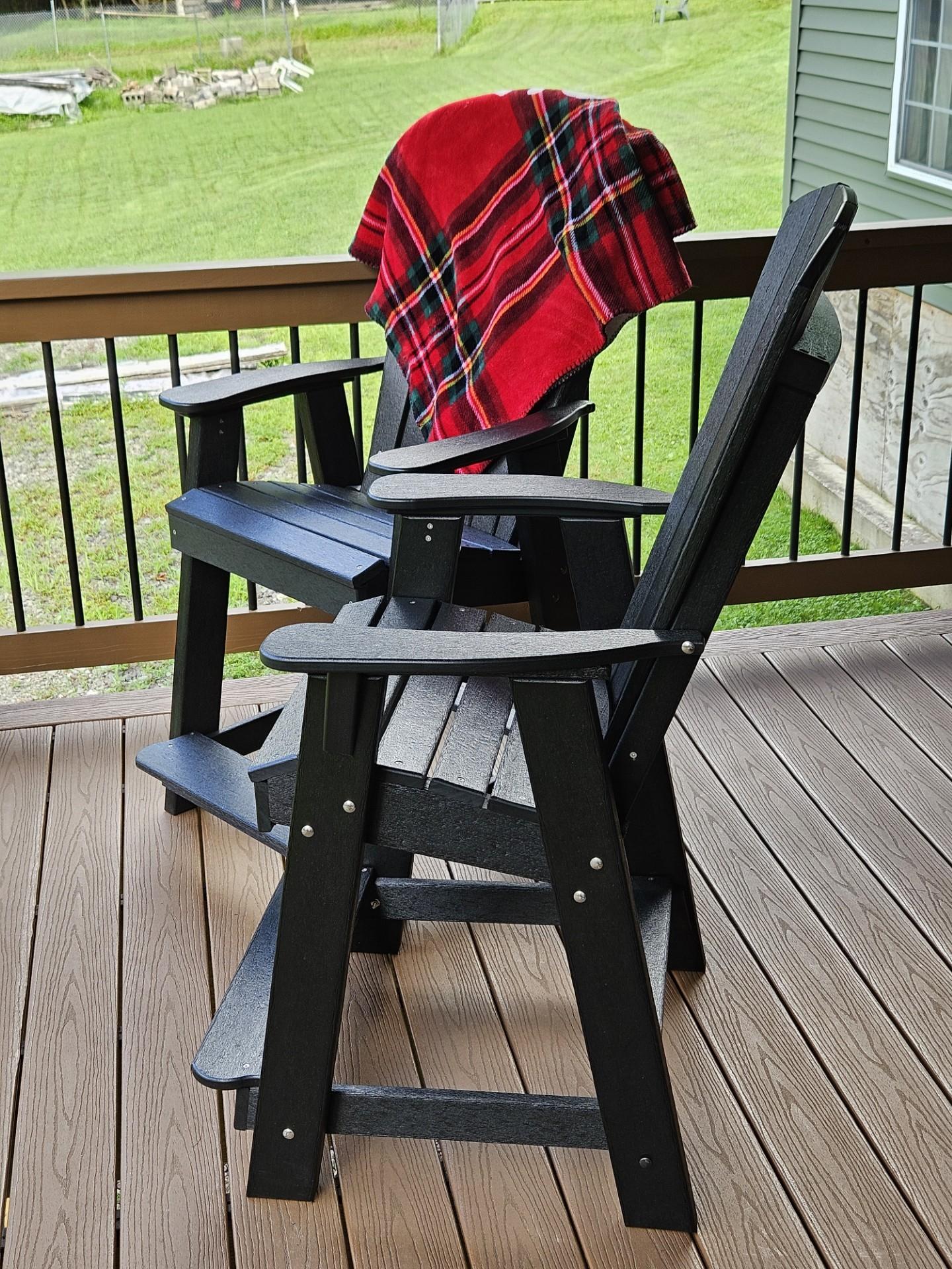 LCC-150 Heritage Balcony Chair in Black with red plaid blanket on porch