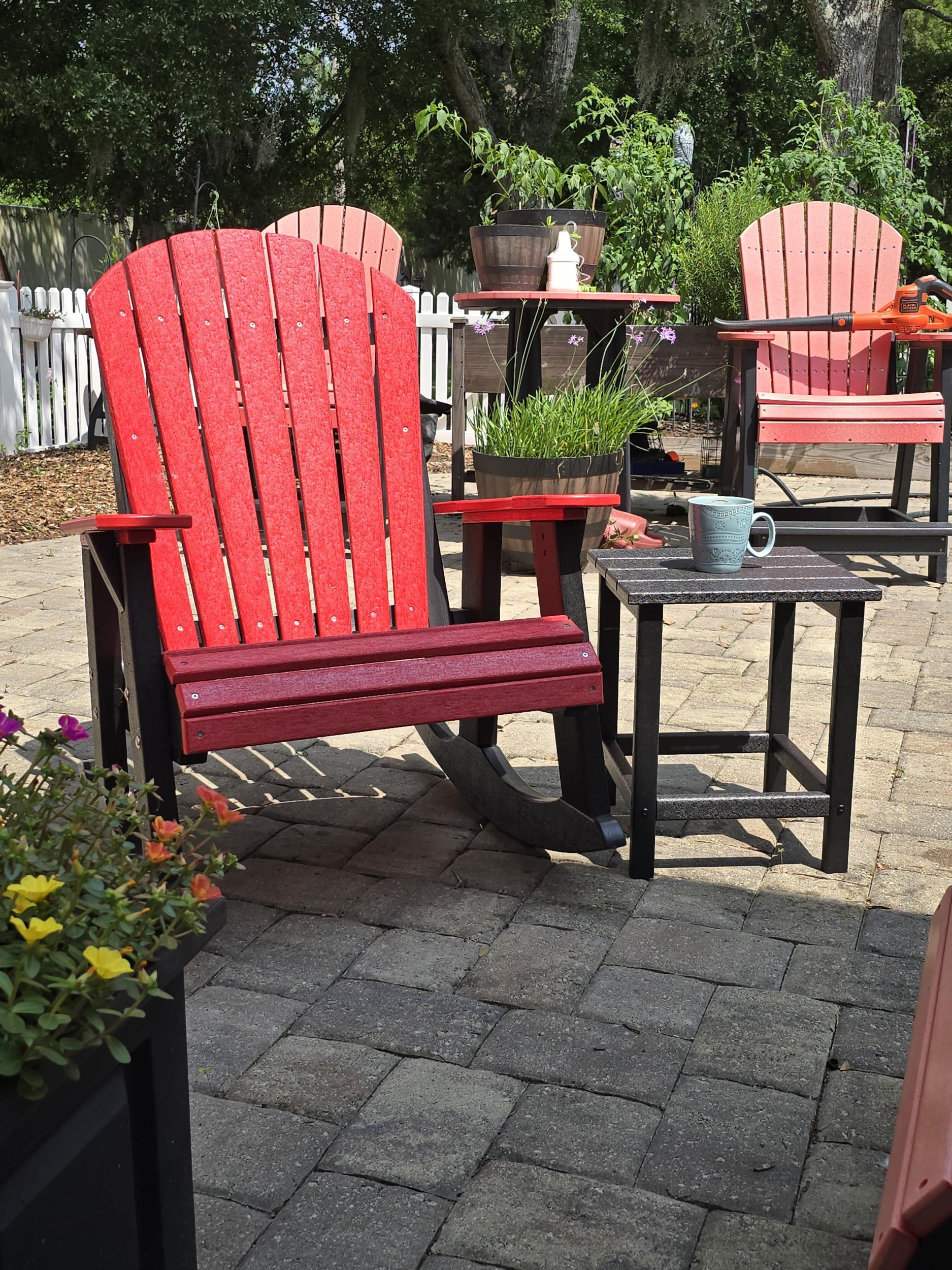 LCC-115 Heritage Adirondack Rocking Chair in Red and Black on a patio setting