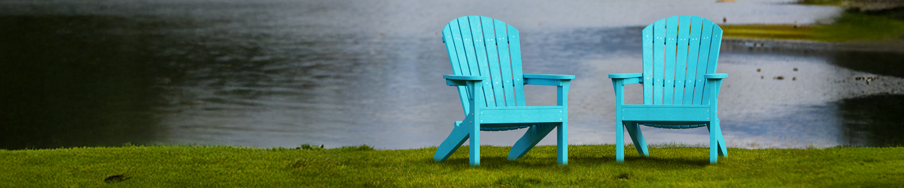 Blue adirondack chairs in front of lake