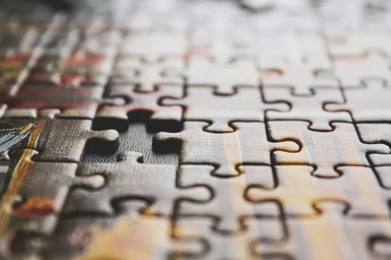 Puzzle with missing piece, illustrating the gap in traditional mentoring