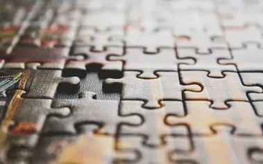 Puzzle with missing piece, illustrating the gap in traditional mentoring