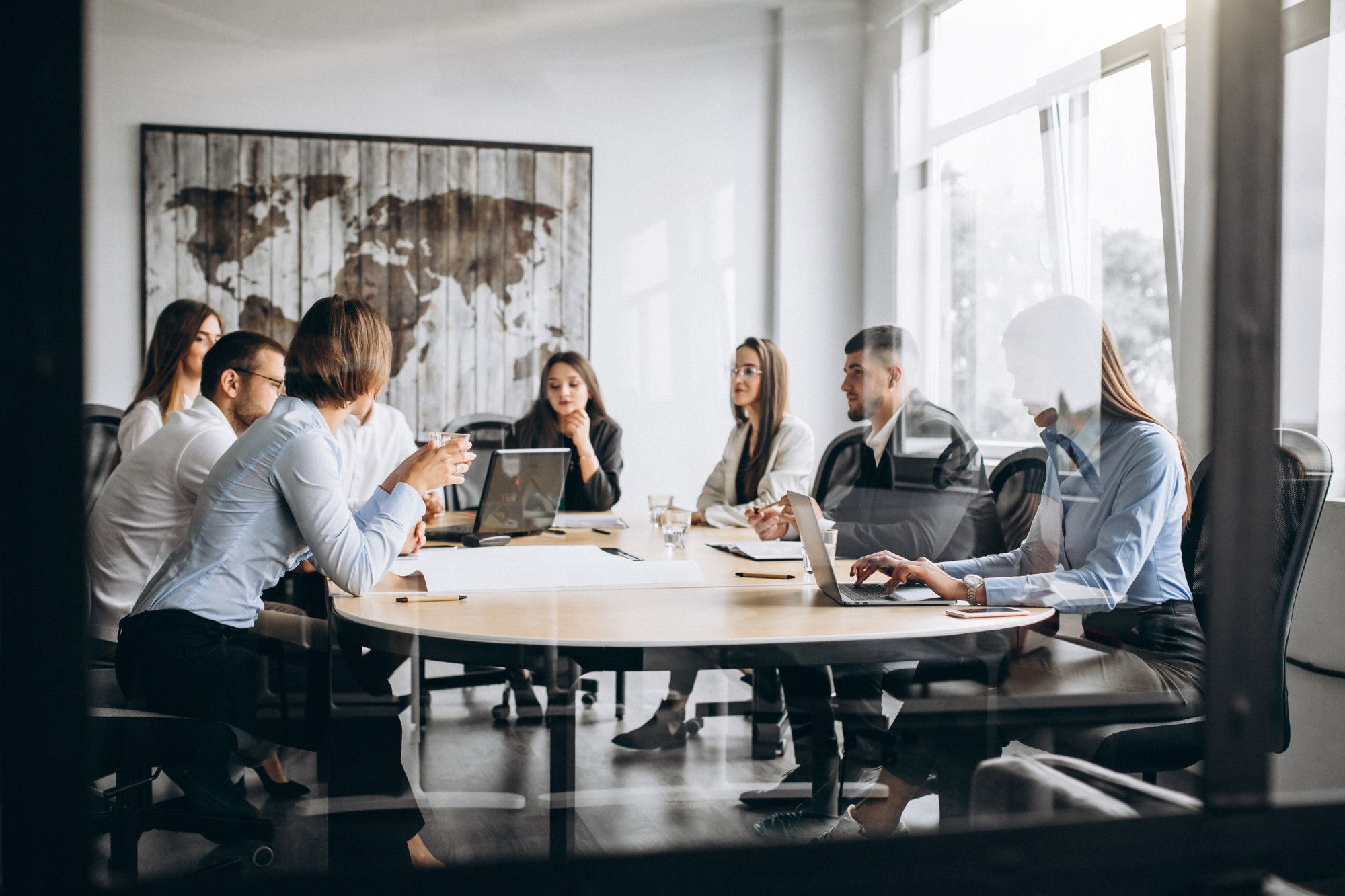 Advisors reviewing a transaction in the IDC Advisory offices