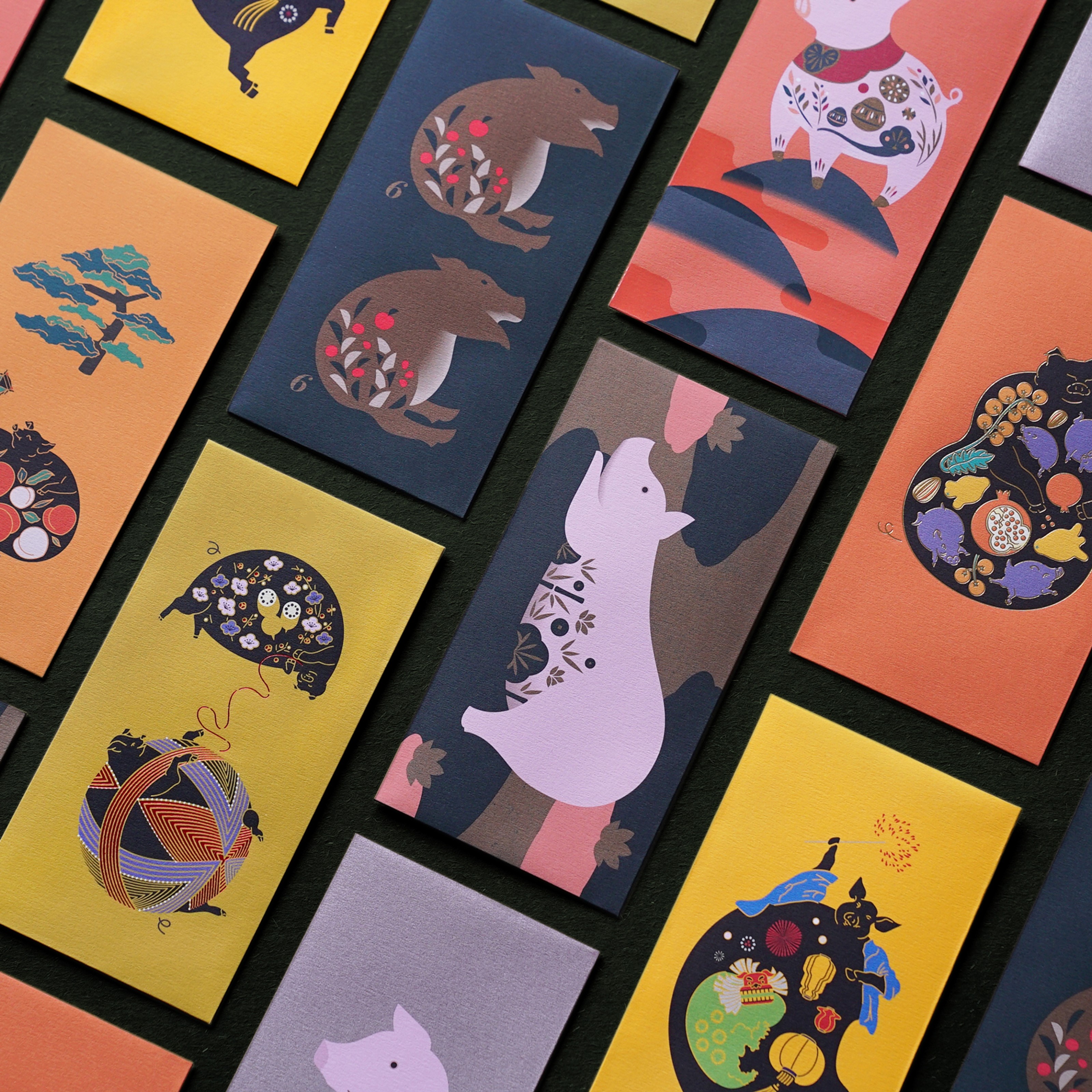 A collection of colorful decorative envelopes, many featuring illustrations of stylized pigs and nature.