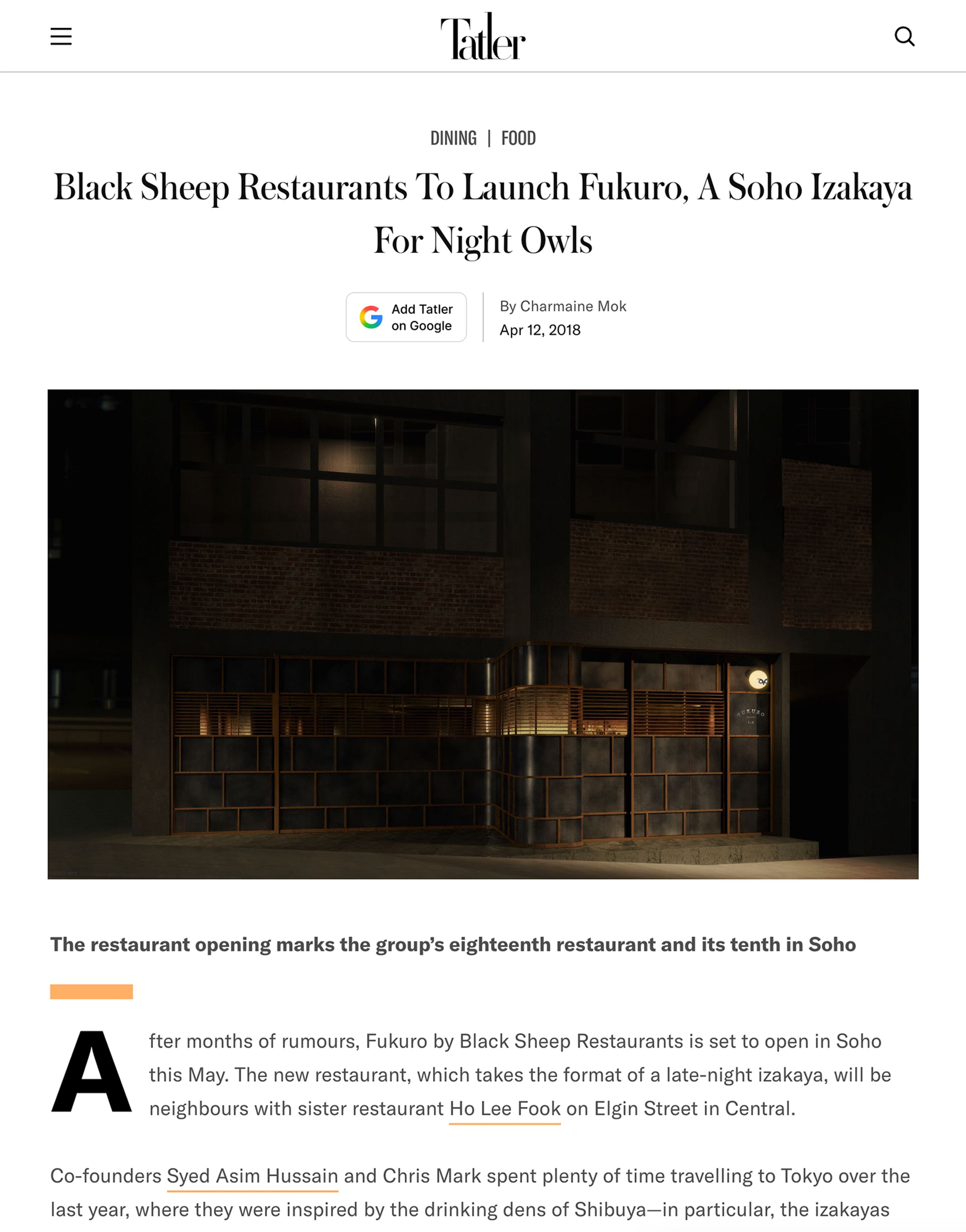 Dark, modern exterior of Fukuro restaurant, with warm interior lighting visible through windows.