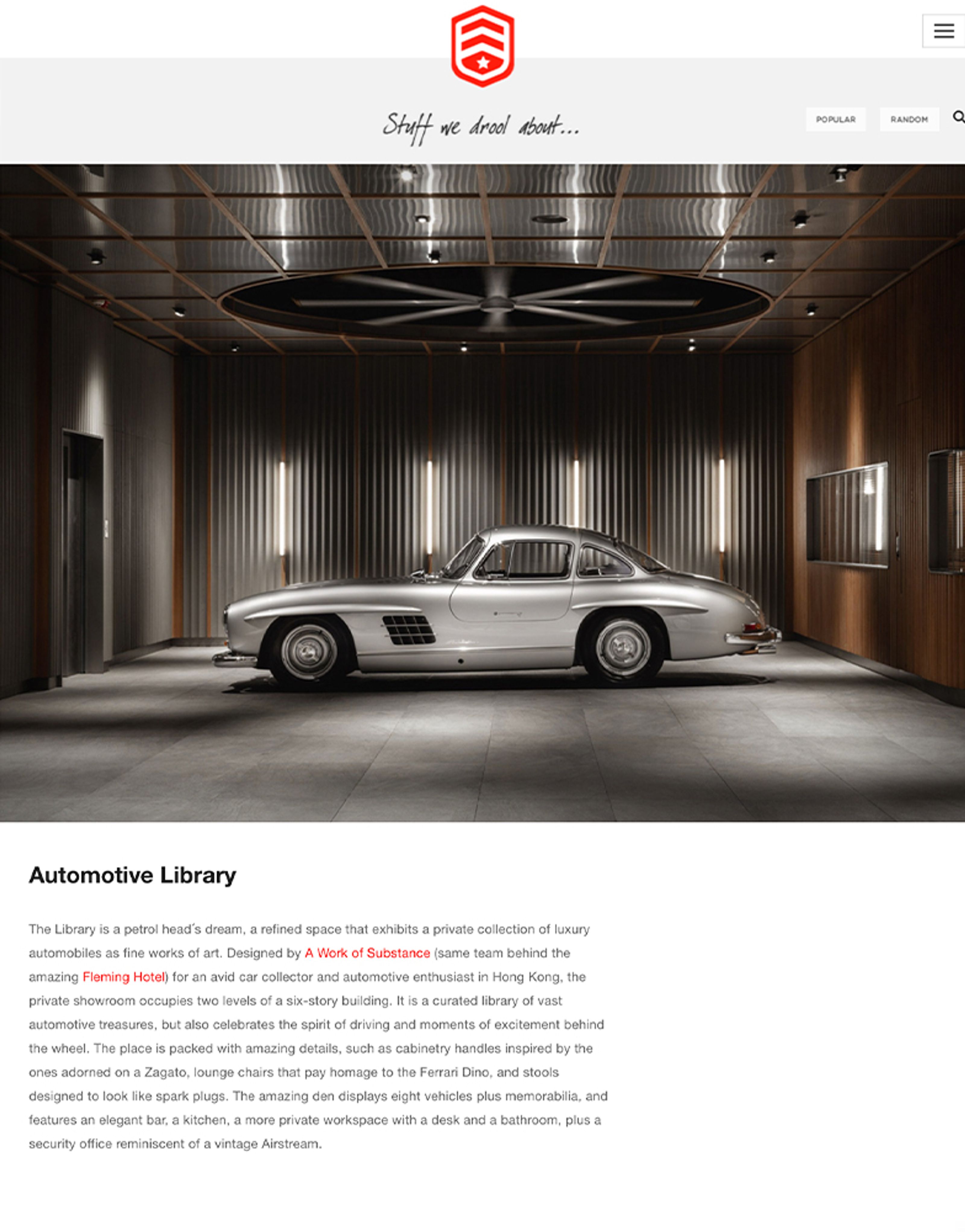 Silver vintage Mercedes-Benz 300 SL Gullwing in a luxurious automotive library.