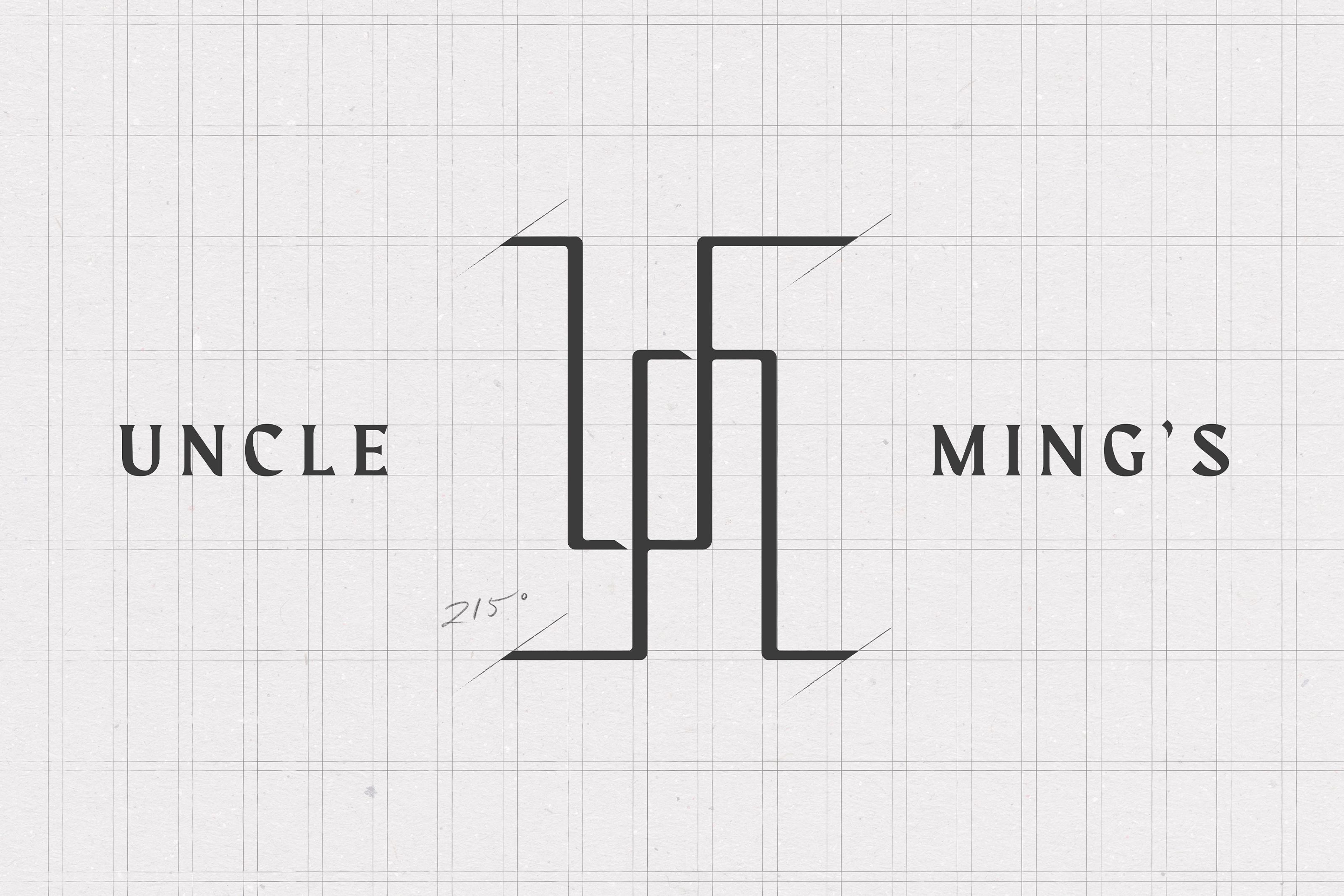 Uncle Ming's logo design on grid paper, featuring a central geometric symbol.