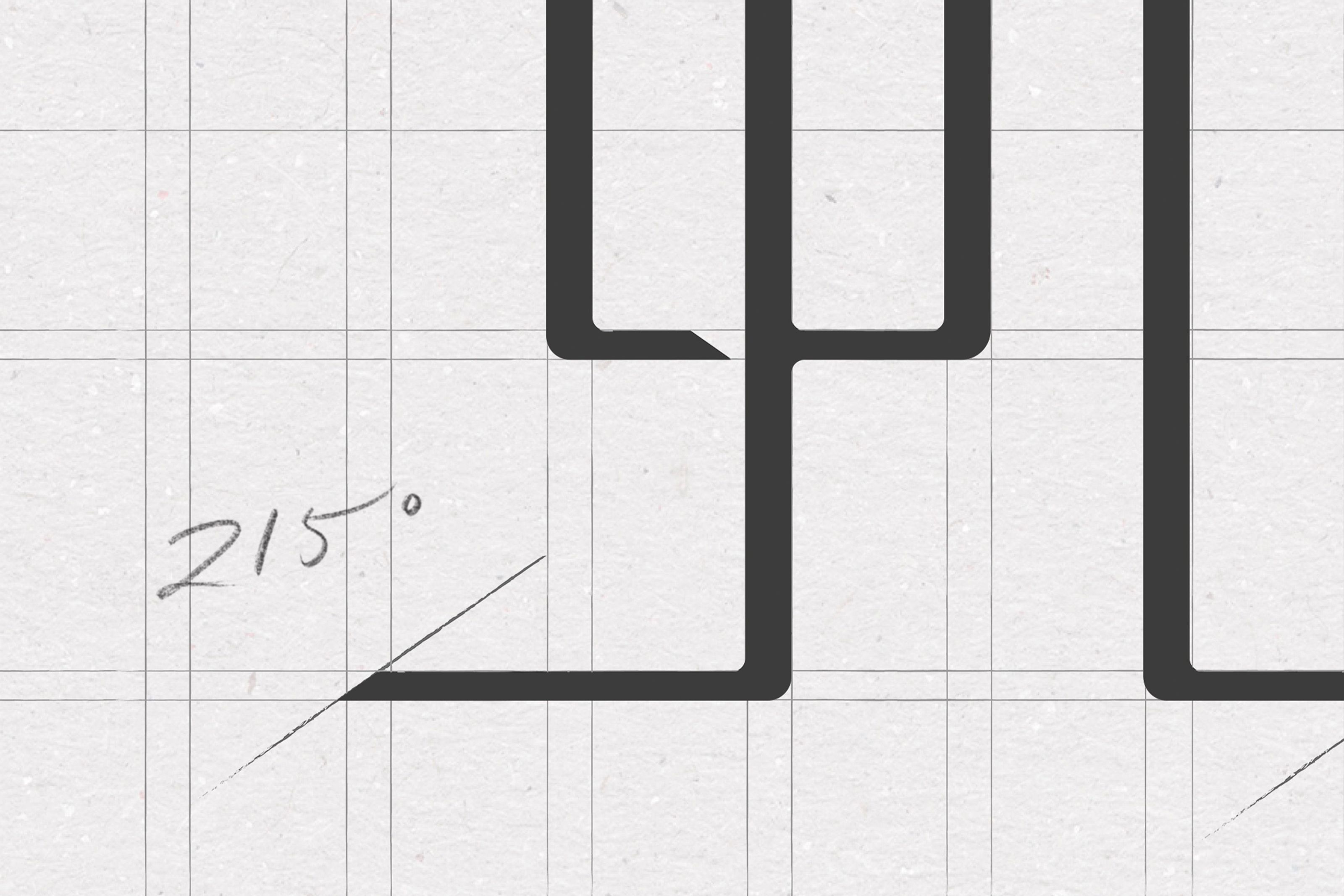 Technical drawing on grid paper with black lines and a handwritten 215-degree angle.