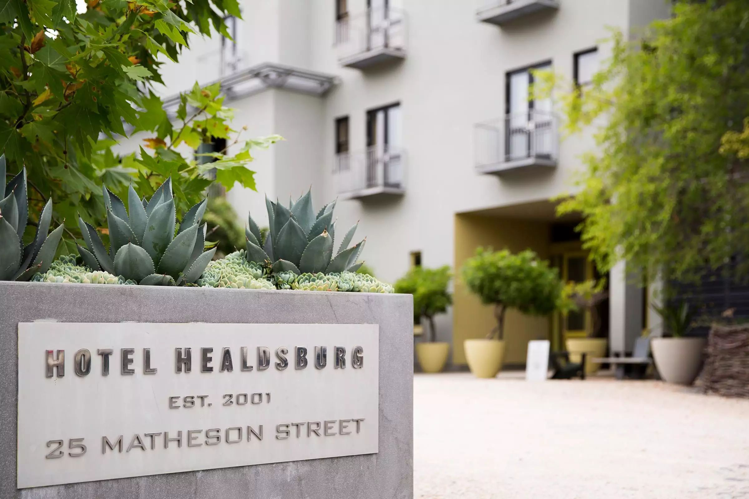 The entrance to Hotel Healdsburg with lush plantings