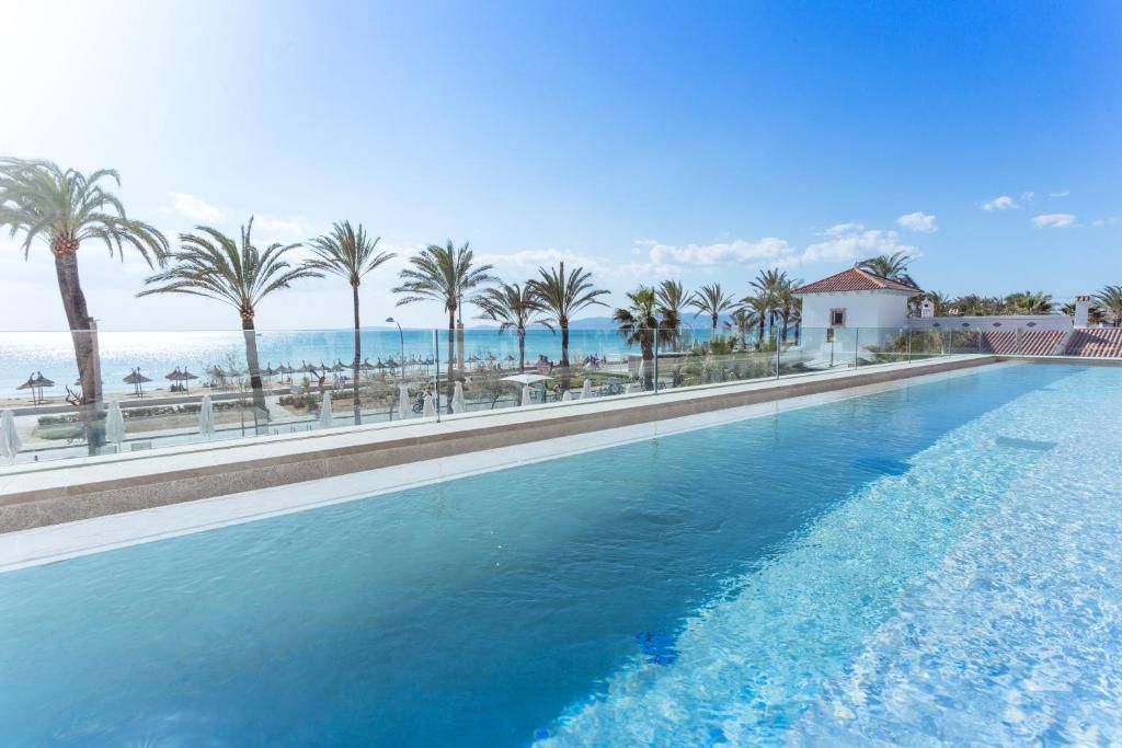Nyd hyggelige omgivelser på voksenhotellet MySeaHouse Flamingo, som ligger ved havet i Playa de Palma.