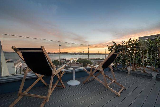 Utsikt over elven fra LX Boutique Hotel i Lisboa